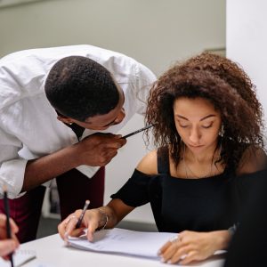 A man scolds a teen as they look at their homework. Learn how counseling for teens in Huntsville, AL can support you in overcoming anger and strong emotions in your teen. Counseling for teens in Huntsville, AL can offer support today. 