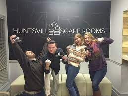 A photo of four teens celebrating winning an escape room. Learn new teen activities by contacting teenage therapists near Huntsville, al today. Or, search for counseling for teens in Huntsville, AL to learn more. 